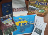 На столі лежать книги на тему: "Крим - Україна". 